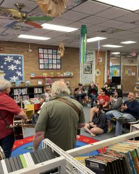 Members of Buck McCumbers and Company perform at the Ravenswood Library 2021 Open House